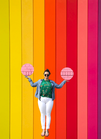 Karin in front of a colorful wall